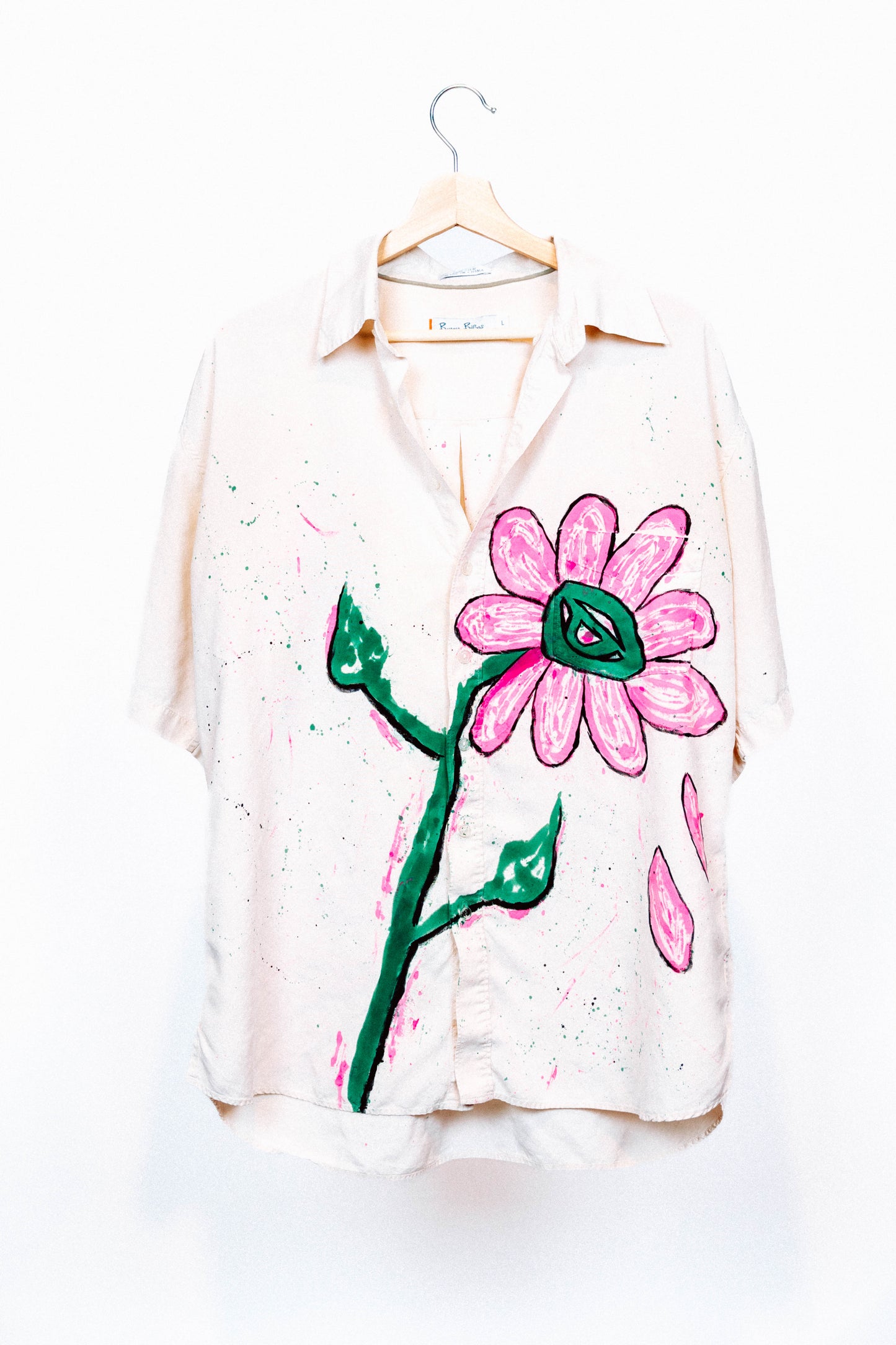 Cream colored 1 of 1 Spray Painted and Hand Painted Button Up from where is up? Made out of 100% Silk.