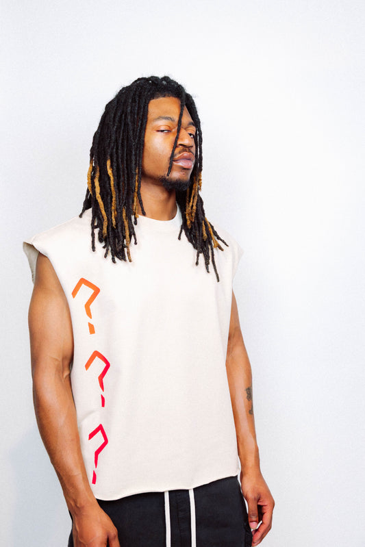 Man wearing limited edition "REVIVAL" Cut -off tee in front of a white background